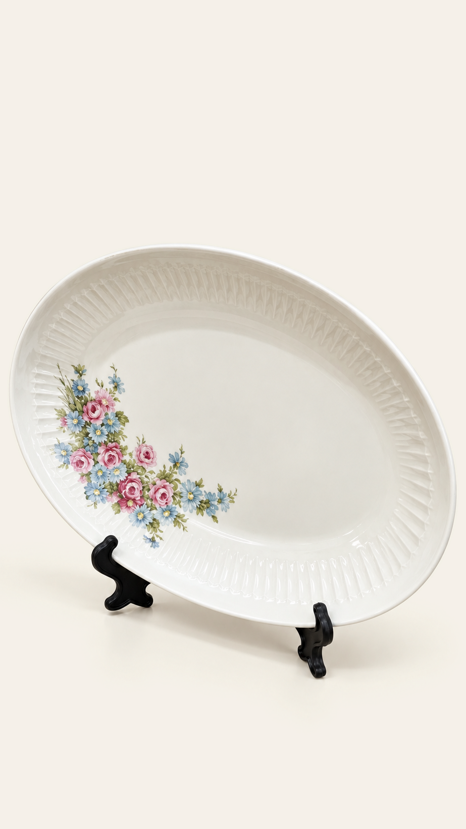 Plat ovale fleuri à bord plissé
